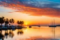 A vibrant, multi-colored sunset over a tranquil bay, with boats at anchor
