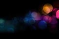 Vibrant Multicolor Bokeh Lights on Dark Background for Creative Design Concepts