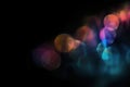 Vibrant Multicolor Bokeh Lights on Dark Background for Creative Design Concepts