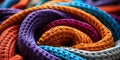 Vibrant multicolored crocheted blankets in a close up view showcasing textures and patterns in a cozy intertwined heap Royalty Free Stock Photo