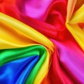 Vibrant Multicolored Fabric with Dynamic Folds and Rich Texture