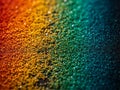 Vibrant multicolored glittering particles background Royalty Free Stock Photo