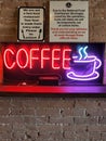 Vibrant neon sign reads 'Coffee'