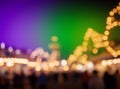 Vibrant night market with blurred lights and colorful sky Royalty Free Stock Photo