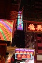 Vibrant night with neon lights of Hong Kong's Temple Street Night Market in Yau Ma Tei, Kowloon