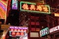 Vibrant night with neon lights of Hong Kong's Temple Street Night Market in Yau Ma Tei, Kowloon