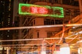 Vibrant night with neon lights of Hong Kong's Temple Street Night Market in Yau Ma Tei, Kowloon