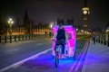 Vibrant Night Scene: Rickshaw & Parliament