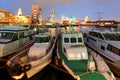 Vibrant night scenery of Yokohama Minatomirai Bay Area with boats and ships parking in the marina