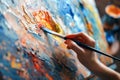 Vibrant Oil Painting in Progress Captured in Artists Studio During Daytime Royalty Free Stock Photo