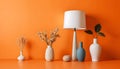 Modern Home Decor with Vases and Lamp on Vibrant Orange Background Royalty Free Stock Photo