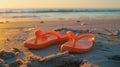 Vibrant orange flip-flops rest on sun-kissed sands, Ai Generated Royalty Free Stock Photo