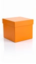 Vibrant orange gift box with lid product packaging isolated on a pristine white background Royalty Free Stock Photo