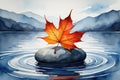 Vibrant orange maple leaf floating on a stone in calm water with mountain backdrop Royalty Free Stock Photo