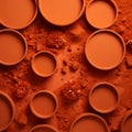 Vibrant Orange Paint Pots On A Brown Background