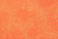 Vibrant orange plaster wall texture. Abstract textured background Royalty Free Stock Photo