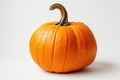 Vibrant Orange Pumpkin Isolated on a White Background Signaling Autumn Harvest A ripe, brightly colored orange pumpkin sits center Royalty Free Stock Photo