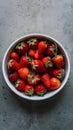 Vibrant Organic Strawberries White Dish on Muted Gray Background
