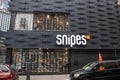 Vibrant outdoor storefront of Snipes in New York, United States