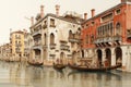 A vibrant painting capturing the essence of Venice, Italy, featuring a gondola peacefully gliding through the picturesque canals,