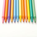 Vibrant palette Colorful pens on a clean white background