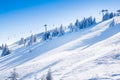 Vibrant panorama of the slopes at ski resort Kopaonik, Serbia, snow trees, blue sky Royalty Free Stock Photo