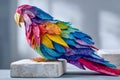 Colorful paper parrot sculpture with vibrant feathers, showcasing intricate craftsmanship and artistic design, perfect for Royalty Free Stock Photo