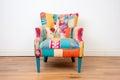 vibrant patchwork fabric upholstered accent chair Royalty Free Stock Photo