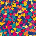 A vibrant pattern of multicolored hearts in different sizes, overlapping and arranged randomly. A Royalty Free Stock Photo
