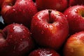 vibrant photo, featuring red ripe apples glistening in water droplets, set against a delectable fruity background.