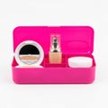 Pink makeup organizer with compact mirror and beauty essentials Royalty Free Stock Photo