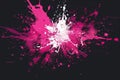 Vibrant pink paint splash on black background Royalty Free Stock Photo