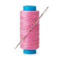 Pink Thread Spool with Blue Core and Silver Sewing Needle image photo Royalty Free Stock Photo