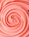 Vibrant Pink Swirl Frosting Closeup Texture of Sweet Culinary Dessert Icing Royalty Free Stock Photo