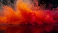 Vibrant plumes of intense orange and deep red ink explode suspended in clear liquid creating a dramatic abstract background of Royalty Free Stock Photo