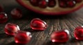Vibrant pomegranate arils glow on rustic wood Royalty Free Stock Photo