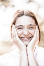 Joyful Radiance: Laughing Woman with Natural Beauty