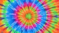 Vibrant psychedelic tie dye pattern with a central explosion of rainbow colors and radiating lines Royalty Free Stock Photo