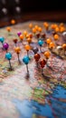 Vibrant pushpins mark various planned destinations on a colorful and detailed map