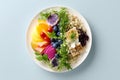 Vibrant quinoa salad with grilled fish, fresh greens, and fruit Royalty Free Stock Photo