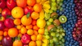 Vibrant rainbow array of fresh fruit, from citrus to berries, full of natural vitamins