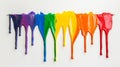 Vibrant rainbow paint drips