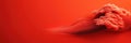 Vibrant red background with flowing lines and cloud like shapes creates dynamic visual