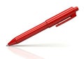Bright red ballpoint pen on a white background Royalty Free Stock Photo