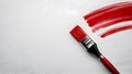 Vibrant Red Brush Strokes on White Canvas with Empty Space for Copy Writing Royalty Free Stock Photo