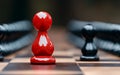 A vibrant red chess pawn placed on a chessboard, symbolizing strategy and focus in the classic game Royalty Free Stock Photo