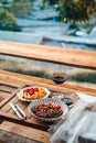 Vibrant red chili peppers and assorted spices in a wooden bowl, a fresh and healthy addition to your kitchen ingredients, Royalty Free Stock Photo