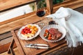 Vibrant red chili peppers and assorted spices in a wooden bowl, a fresh and healthy addition to your kitchen ingredients, Royalty Free Stock Photo