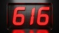 Vibrant Red Digital Number 616 on Dark LED Display Screen, Modern Technology Numeric Background Royalty Free Stock Photo