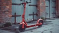 Red electric scooter against brick wall